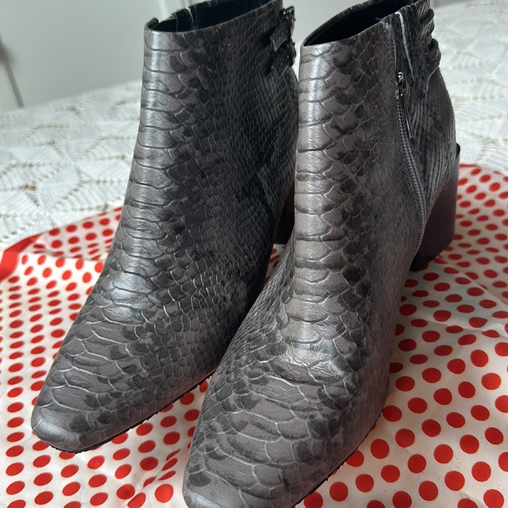 Donald Pliner snakeskin look shoe boots.  Worn once.